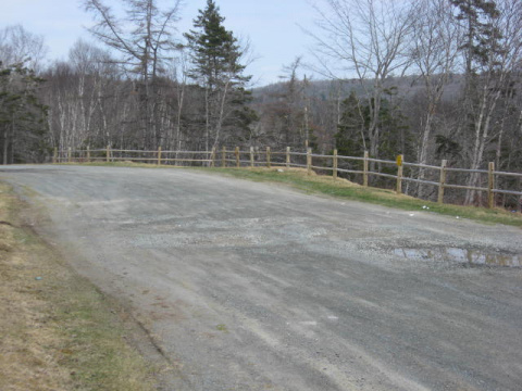 open gravel parking lot located at Spry Bay Park